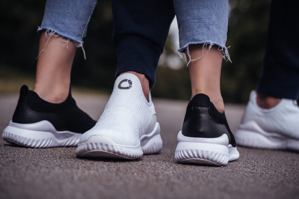 People feet wearing trainers 