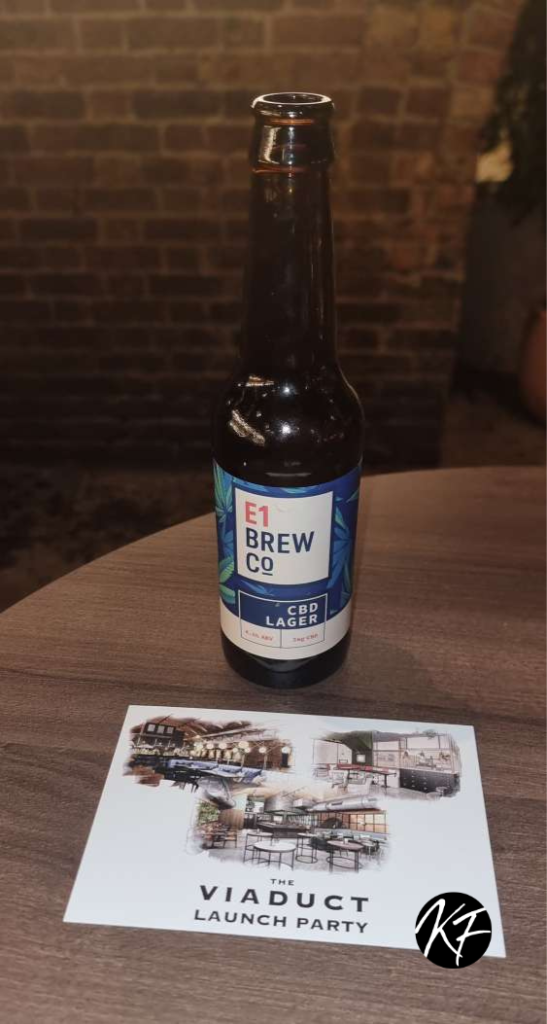 Viaduct Launch Party card and CBD Lager from E1 Brew Co