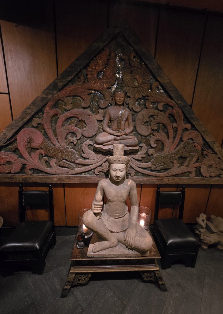 Decorative Buddhist Statue Inside The Restaurant