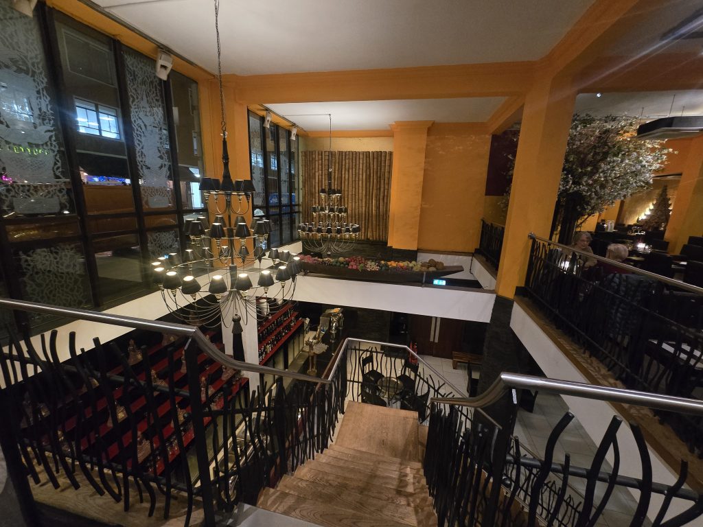 Interior of Thai Square Minories restaurant in London with warm lighting and romantic décor.