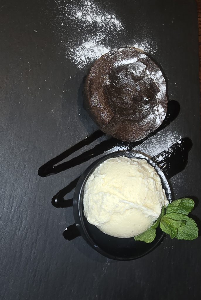 Chocolate pudding with vanilla ice served at Thai Square Minories.