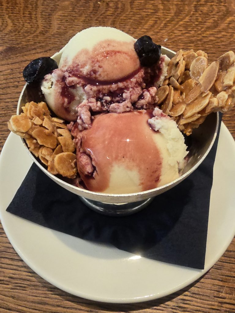 Vanilla Gelato with sour cherries and almond croccante